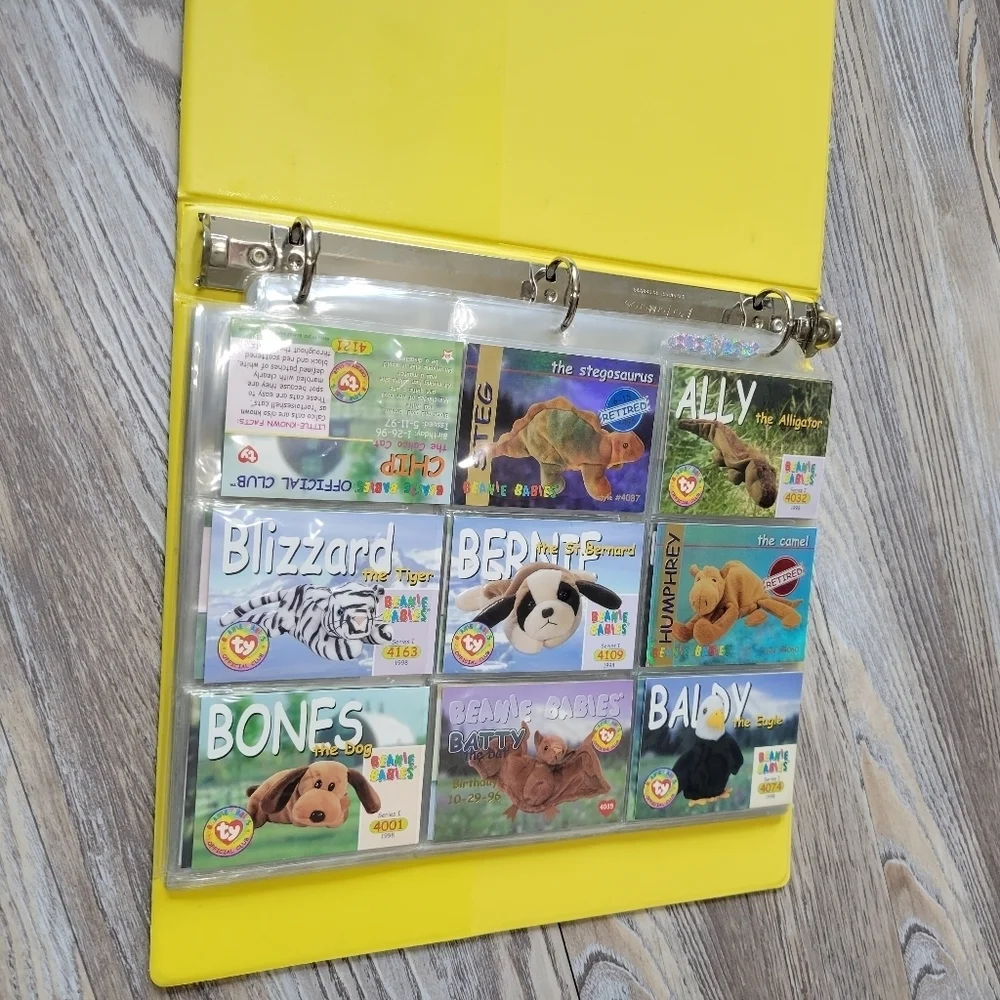 Vintage 1998 Beanie Babies card binder with 49 cards yellow